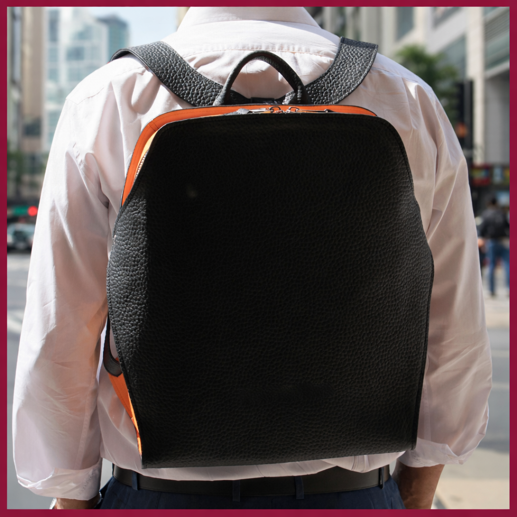 Zaino business pelle vera bovina artigianale italiano con scomparto PC imbottito e tracolla